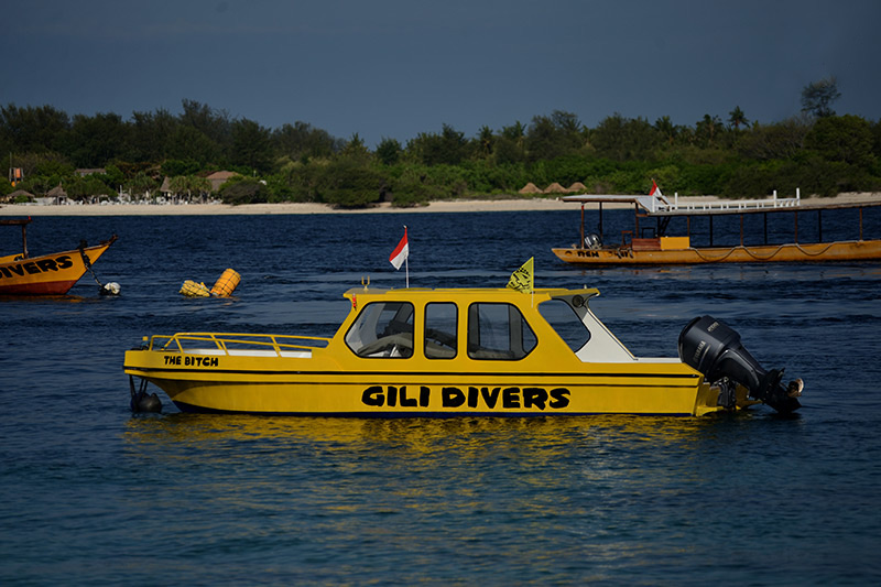 The Bitch, smallest of Gili Divers fleet in front of Mt. Rinjani